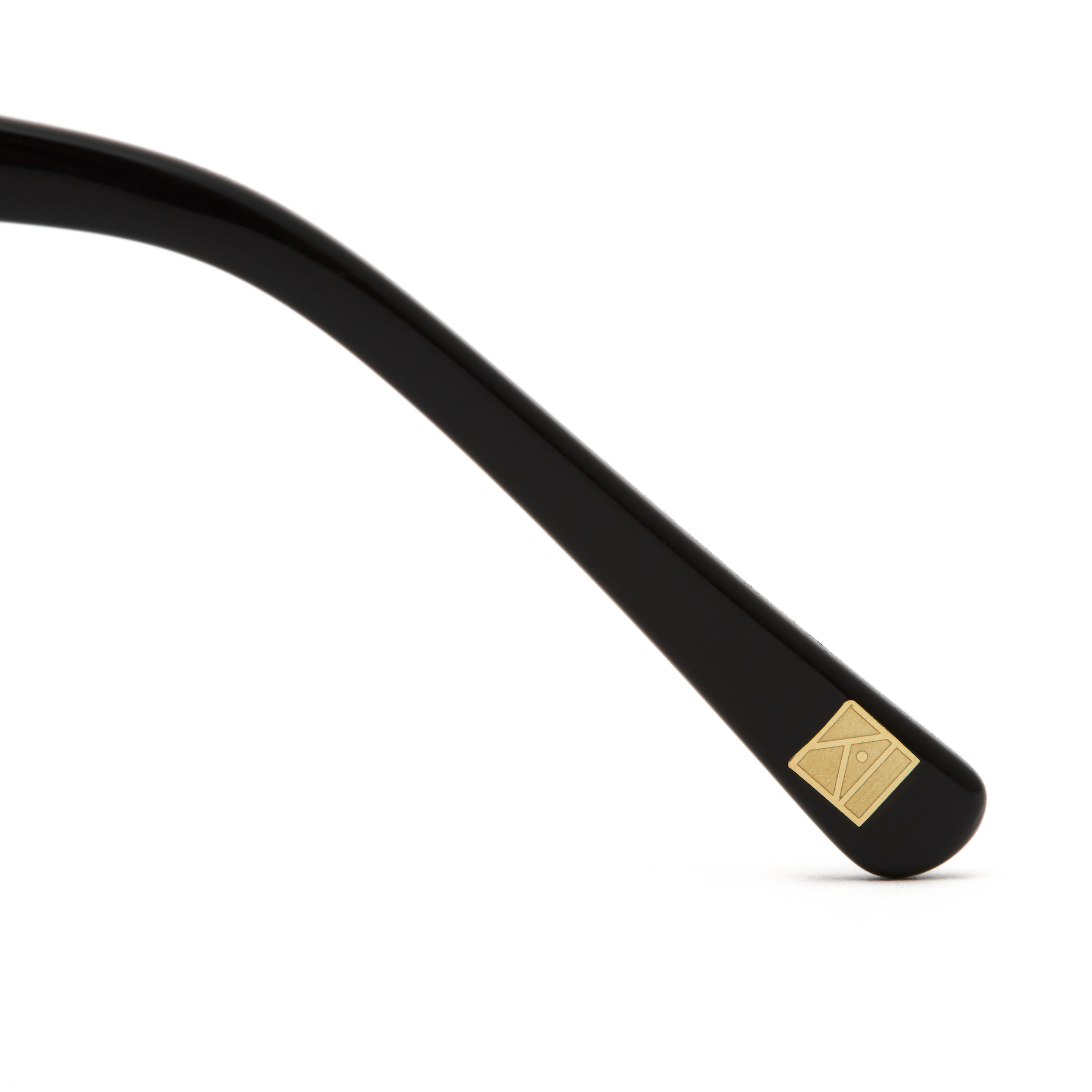 KayTran Eyewear Taylor - Polished Black temple arm features a small gold square detail near the tip on white background.