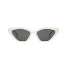 Naomi - Birch cat-eye sunglasses by KayTran Eyewear, white frame with dark lenses on a plain white background.