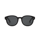 KayTran Eyewears Reese - Polished Black round sunglasses with dark lenses, front view on a white background.