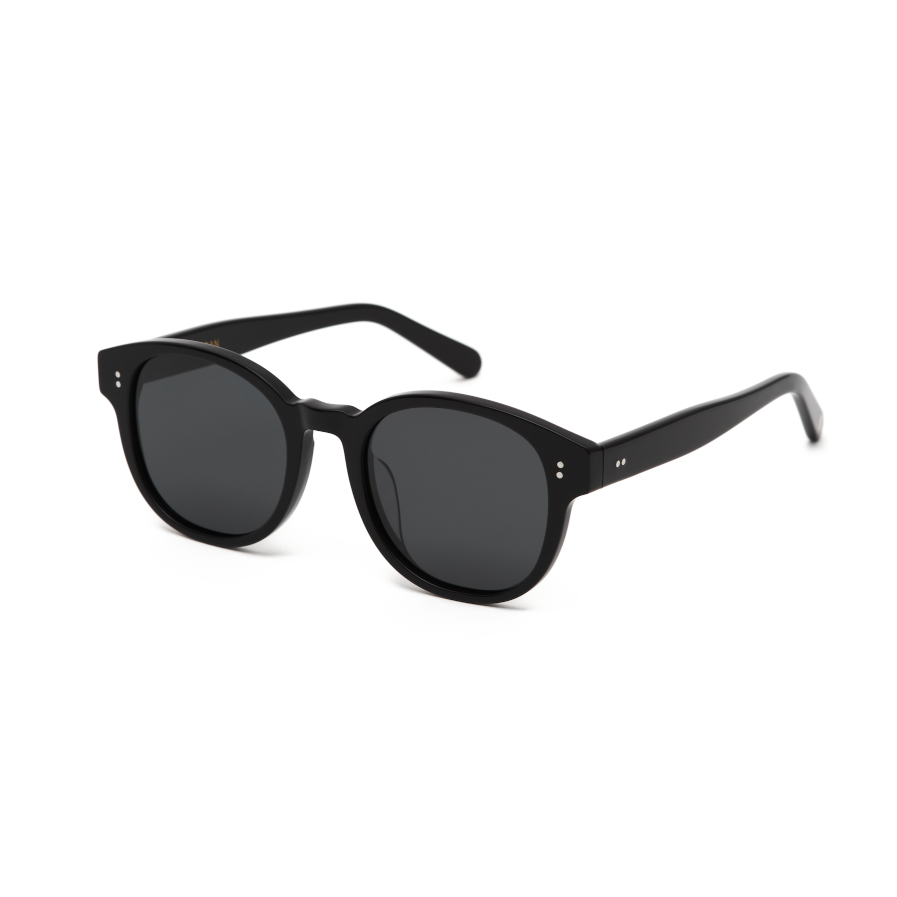Reese - Polished Black round sunglasses by KayTran Eyewear, dark lenses, angled right on a white background.