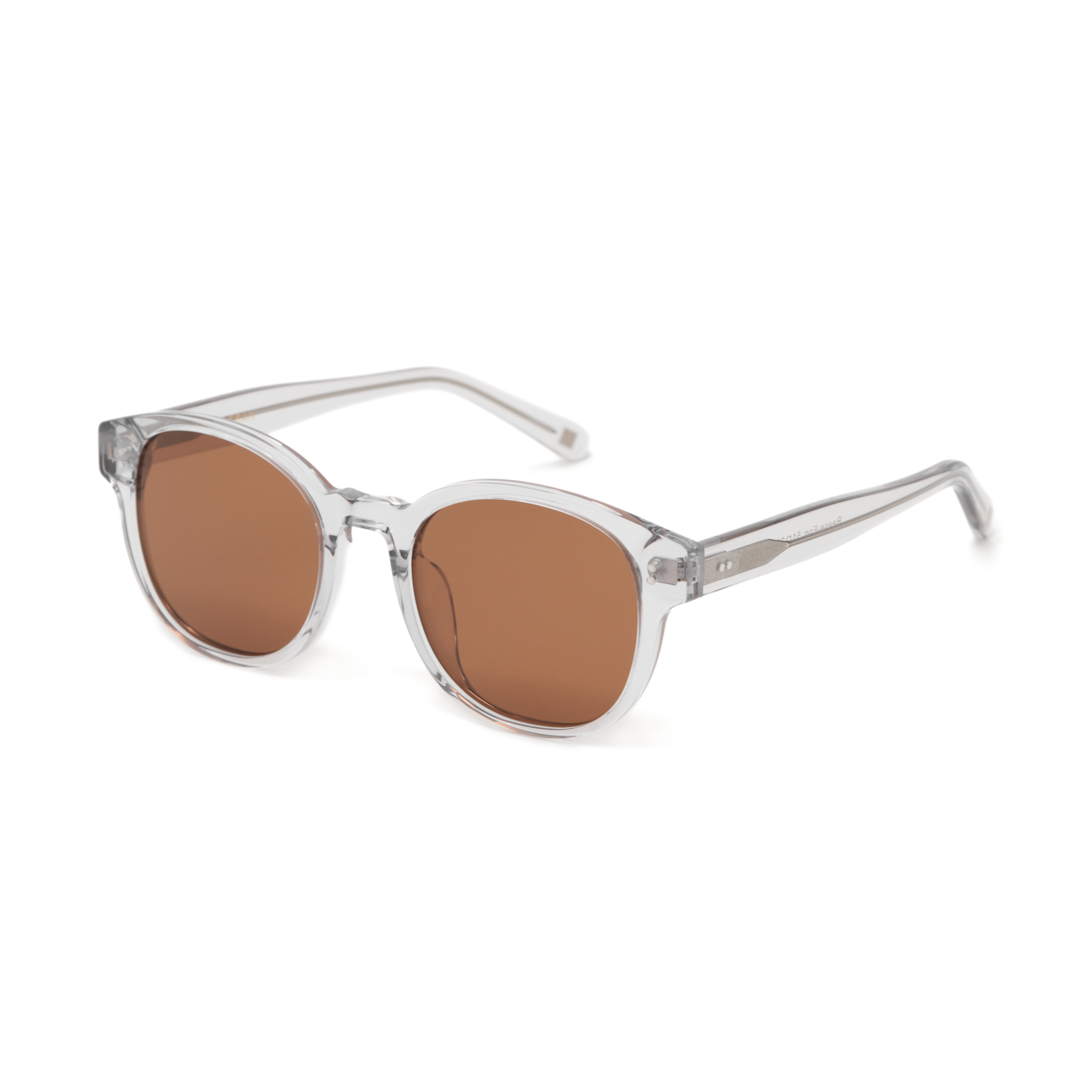 Reese - Fog by KayTran Eyewear: clear frames with round brown lenses, displayed angled on a plain white background.