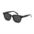 Charlie - Polished Black sunglasses by KayTran Eyewear feature black square frames, dark lenses, and silver accents.