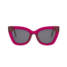 Front view of KayTran Eyewear Arlo - Berry cat-eye sunglasses with translucent pink frames and dark lenses.