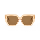 Front view of KayTran Eyewear Luna - Apricot oversized square sunglasses with translucent beige frames and brown lenses.
