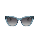 Front view of KayTran Eyewear Harper - Sea Pine blue cat-eye sunglasses with dark gradient lenses on white background.
