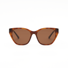 Taylor - Honey Tort cat-eye sunglasses by KayTran Eyewear, dark lenses, shown front view on a white background.