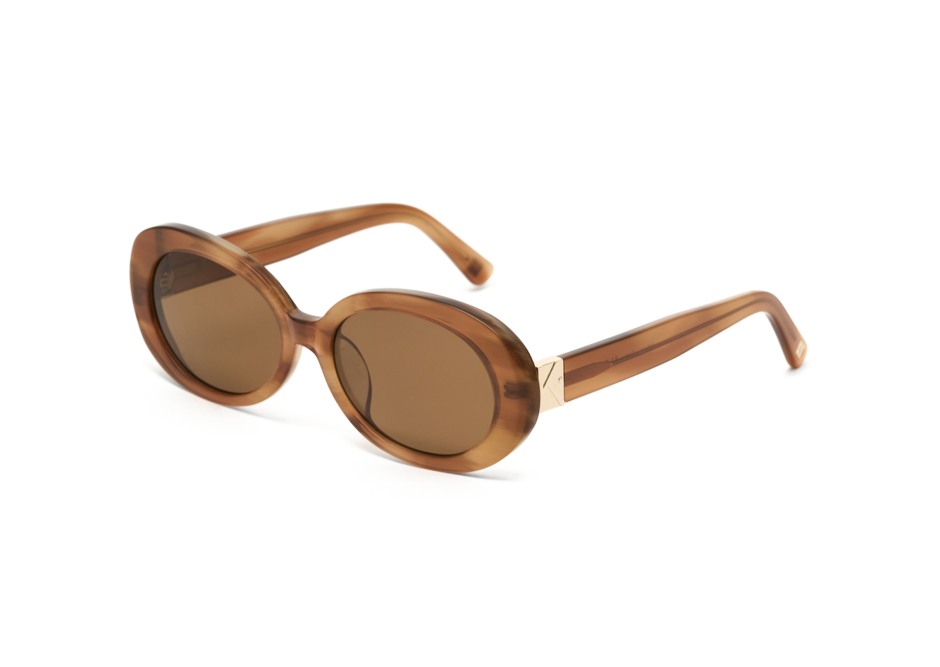 Mara - Latte oval sunglasses by KayTran Eyewear, thick frames and tinted lenses, shown on white background.